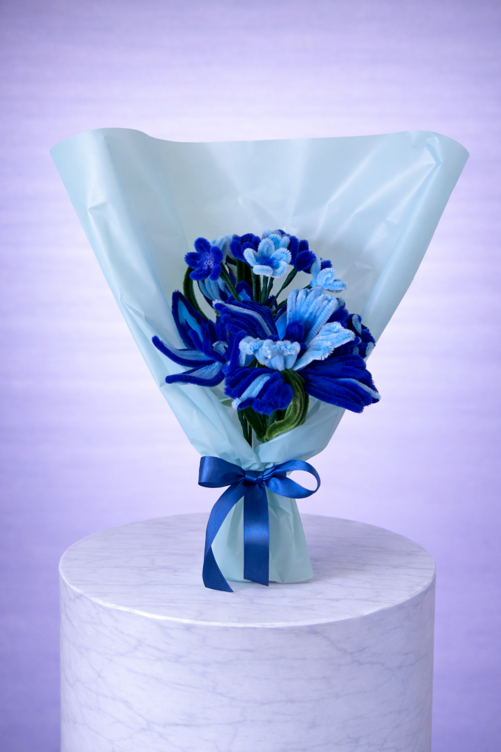 Bouquet de fleurs éternelles bleu