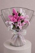 Bouquet éternel de magnolias roses