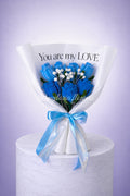 Bouquet éternel de 7 roses Bleu
