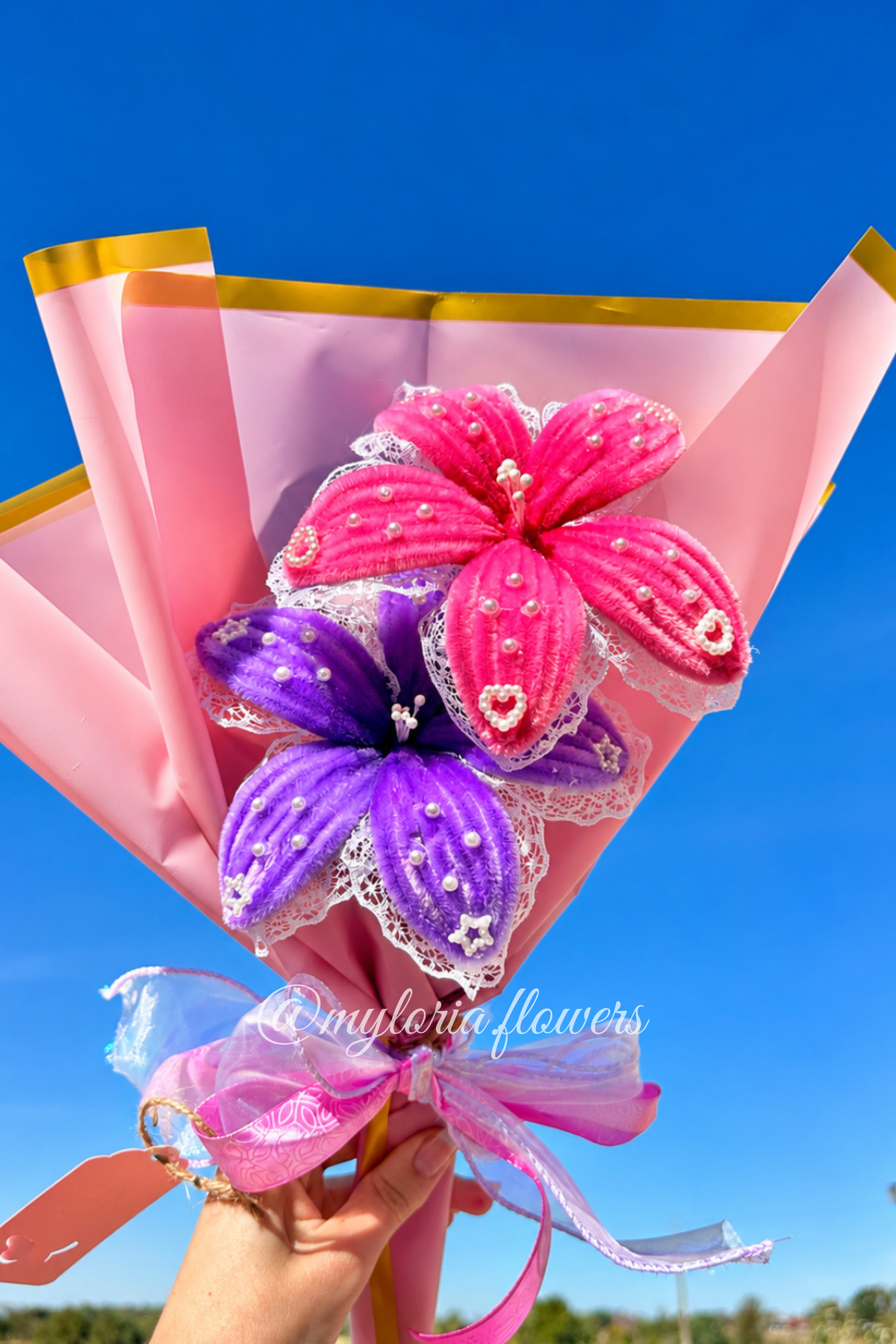Bouquet de fleurs éternelles rose et violet