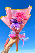 Bouquet de fleurs éternelles rose et violet